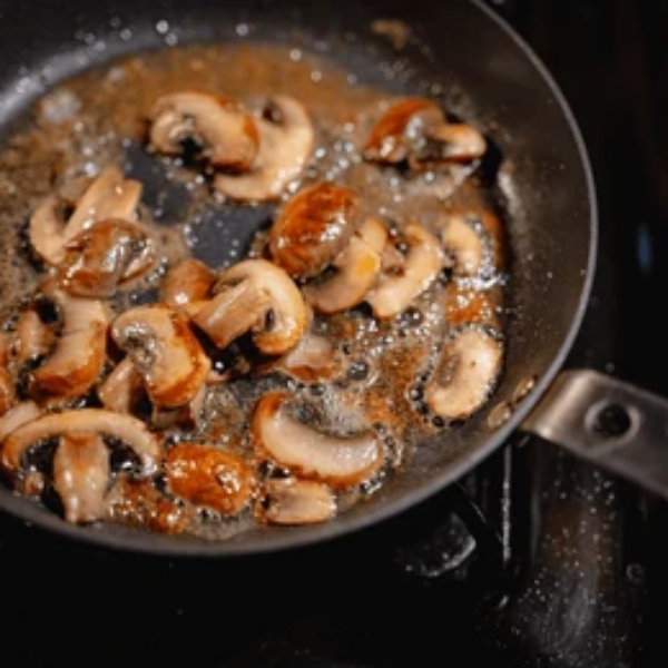 Sauteed mushrooms in a pan